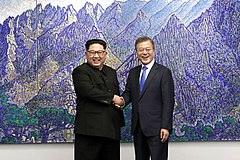 Image 20North Korean leader Kim Jong-un and South Korean President Moon Jae-in shaking hands inside the Peace House on 27 April 2018 (from History of South Korea)