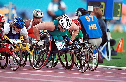 281000 - Athletics wheelchair racing Louise Sauvage action 2 - 3b - 2000 Sydney race photo