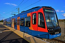 A class 399 tram-train vehicle in operation on the Sheffield Supertram network. The Greater Manchester Combined Authority is investigating the use of similar vehicles to extend services onto under-utilised heavy rail lines across Greater Manchester and beyond. 399206 Parkgate.jpg