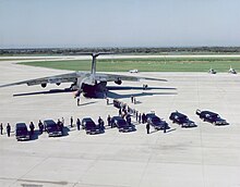 A MAC C-141 transports the remains of the crew from Space Shuttle Challenger's doomed last mission to Dover AFB, Delaware.