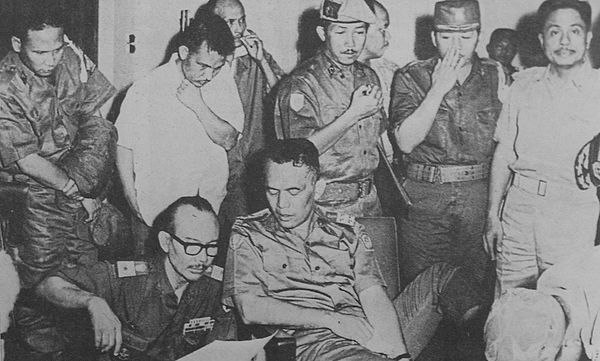 Nasution having his foot treated while discussing the situation at Kostrad HQ on the night of 1 October 1965