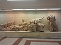 Sculptures exhibited on the concourse level. The sculptures depict Helios' chariot, Dionysus, Demetra, Persephone and Hebe or Artemis.