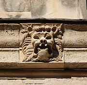 Lion muzzle serving as a gargoyle.