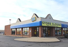 A "now closed" Blockbuster store in Ypsilanti, Michigan undergoing a liquidation sale in 2013 Blockbuster Store Closing, Ypsilanti Township, Michigan.JPG
