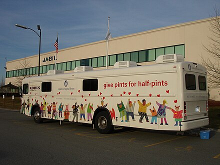 A blood collection bus (bloodmobile) from Children's Hospital Boston at a manufacturing facility in Massachusetts: Blood banks sometimes use a modified bus or similar large vehicle to provide mobile facilities for donation.