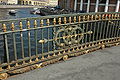 Bolshoi Koniushennyi bridge, fence. St Petersburg, Moika river.