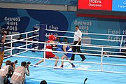 Deutsch: Boxen bei den Olympischen Jugendspielen 2018 Tag 12, 18. Oktober 2018 - Kampf um die Bronzemedaille im Fliegengewicht Mädchen – Heaven Destiny Garcia (USA, blau) schlägt Goryanana Stoeva (Bulgarien, rot) 5-0; Ringrichter ist Ishanguly Meretnyyazov (Turkmenistan). English: Boxing at the 2018 Summer Youth Olympics on 18 October 2018 – Girl's flyweight Bronze Medal Bout - Heaven Destiny Garcia (USA, blue) beats Goryanana Stoeva (Bulgaria, red) 5-0; Referee is Ishanguly Meretnyyazov (Turkmenistan). Español: Boxeo en los Juegos Olímpicos Juveniles de Verano de 2018 en 18 de octubre de 2018 - Combate a medalla de bronce de peso mosca para mujeres: Heaven Destiny Garcia (Estados Unidos, azul) le gana a Goryanana Stoeva (Bulgaria, roja) 5-0; El árbitro es Ishanguly Meretnyyazov (Turkmenistán).