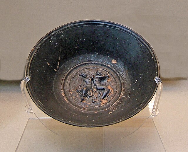 A relief depicting Mars and Venus on a black-slip bowl from Campania, Italy, 250–150 BCE, British Museum