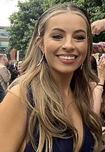 Due to being from Surrey, Jordan used a fellow acting friend as a voice coach for the Mancunian accent. Charlotte Jordan 2022.jpg