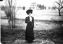 The Cory House with Mrs. Myron Creese, a neighbor of Prof. Cory, in the foreground Cory house.jpg