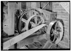 DETAIL OF OVERHEAD SHAFTING, SECOND FLOOR - Ketner Mill, East bank of Sequatchie River, Victoria, Marion County, TN HABS TENN,58-VICT.V,1-22.tif