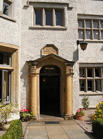 Doorway with Ionic columns, pediment and fanlight Dam House Doorway and inscription.JPG