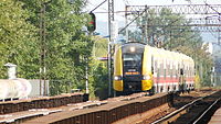 EN77 entering Zabłocie Railroad Bridge