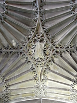 Poyntz Chapel in the Gaunt's Chapel, Bristol, built by Sir Robert Poyntz (died 1520); left: view towards east end formerly occupied by an altar, with Spanish floor-tiles; right: the fan-vaulted ceiling with Poyntz arms impaling Woodville in centre