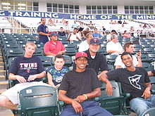 Four players from the 2008 GCL Twins and a fan smile for a picture GCLTwins.JPG