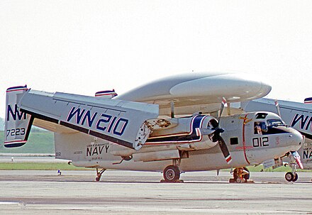 Grumman E-1B Tracer of RVAW-110 after service aboard USS Franklin D. Roosevelt in 1976, showing the Grumman-patented Sto-Wing wing folding arrangement