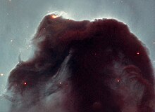 Cosmic dust of the Horsehead Nebula as revealed by the Hubble Space Telescope. Horsehead-Hubble.jpg