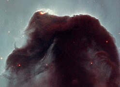 The Horsehead Nebula, an example of a dark nebula.