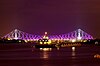 The illuminated Howrah Bridge at night