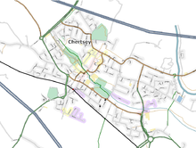 Simple road and watercourse map of the urban and suburban majority of Chertsey, which continues on postal, ecclesiastical parochial and ward definitions to the north and to the south-west.