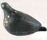 A 4.5 inch long lapis lazuli dove is studded with gold pegs. Dated 1200 BC from Susa, a city later on shared with the Achaemenids.