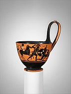Terracotta bowl with a single handle, decorated with a black-figure vase painting of a battle scene