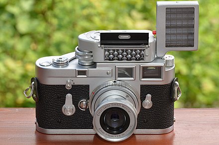 Leica M3 chrome Singlestroke (1958) with Leica-Meter M, Booster and collapsible Elmar f=5 cm 1:2,8 M39 lens with adapter