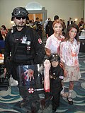 Thumbnail for File:Long Beach Comic Expo 2012 - Resident Evil Umbrella Corp soldiers and zombies (7186649072).jpg