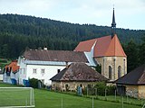 Loučovice - Kostel sv. Oldřicha - celkový pohled s farou