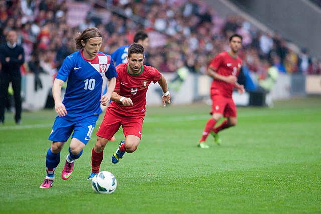 Croatia's Luka Modrić and Moutinho in an international friendly in June 2013