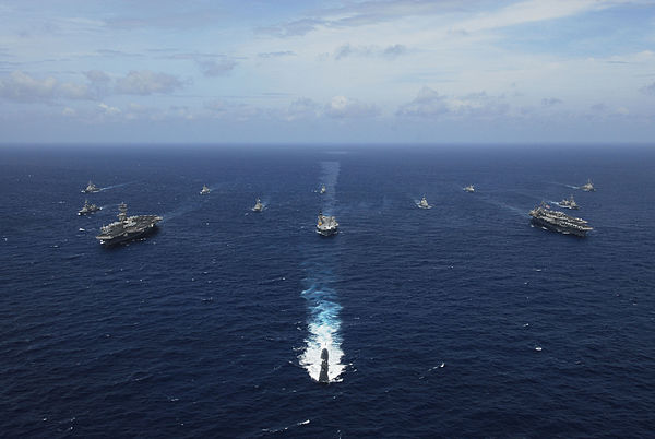 Image of United States ships participating in the Malabar 2007 naval exercise. Aegis cruisers from the navies of Japan and Australia, and logistical s