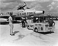 Mark-28 bomb being transported to an F-100 via bomb lift truck by the load crew of the 18th Tactical Fighter Wing at Kadena Air Base.jpg