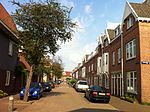 Mezenstraat, rechts woningen van de Maatschappij tot Huizenbouw benoorden het IJ.
