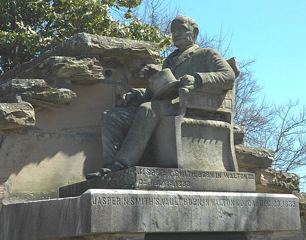 Statue of Jasper Newton Smith atop his mausoleum