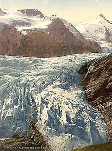 Frozen water, icefall of glacier Pasterze around 1900, today lake, waterfall and rock.