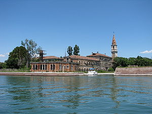 The Lazzaretto, next to it the church tower of San Vitale, and on the right in the foreground Ottagono Poveglia