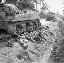 A Sherman tank of 3rd Royal Tank Regiment during the Normandy campaign, August 1944 Rastingtractable.jpg