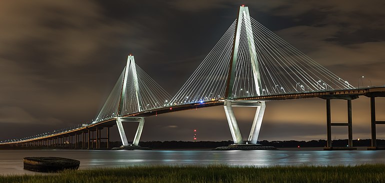The new Arthur Ravenel Jr. Bridge, constructed in 2005 and named after former U.S. Representative Arthur Ravenel Jr., who pushed the project to fruition, was at the time of its construction the longest cable-stayed bridge in the Western Hemisphere. Ravenel Bridge at night from Mt Pleasant (cropped).jpg