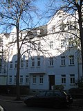 Apartment building in closed development with front garden