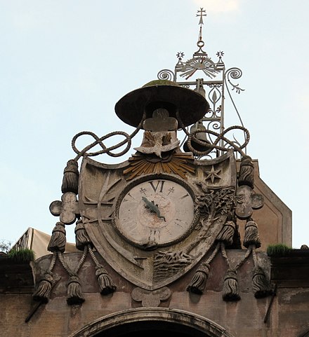 The clock with salamander in the Courtyard of the Well