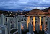 Alija Izetbegović tomb in the Kovači Memorial Cemetery at dusk.