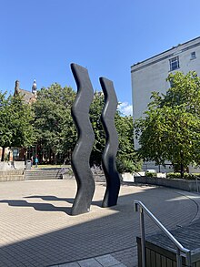 Photograph of Keith Wilson's sculpure 'Sign for Art' on the University of Leeds campus