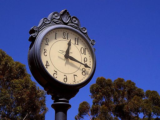 Street iron work clock