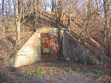 An overgrown bunker from the former Susquehanna Ordnance Depot in State Game Lands 252, 0.6 miles (0.97 km) from Spring Creek