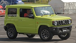 Podłokietnik Suzuki Jimny SN 1998 - ORYGINAŁ - 7823819420