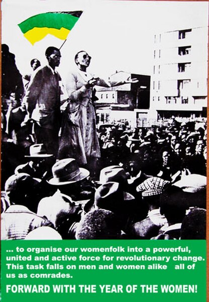 Viola Hashe, blind trade union leader, speaking at a 1952 rally during the "Defiance Campaign". Photo taken in Fordsburg, Johannesburg; poster designe