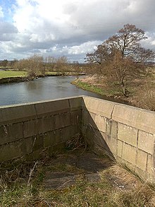 Looking north (upstream) from the bridge deck, showing the top of one of the cutwaters The River Dove - geograph.org.uk - 1196803.jpg