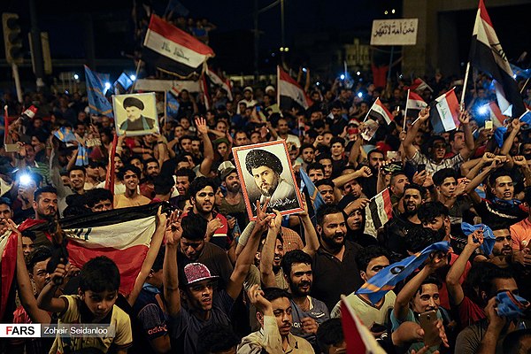 Supporters of Sadr's alliance in Liberation Square, Baghdad celebrating after a successful election campaign