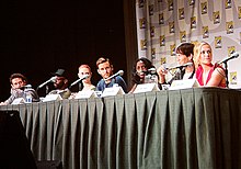 Moyer at 2011 International Comic-Con San Diego with Ryan Kwanten, Deborah Ann Woll, Anna Paquin, Rutina Wesley, and Nelsan Ellis of the TV show True Blood.