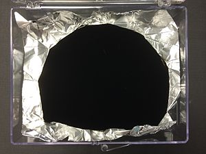 Vantablack is made of carbon nanotubes[34] and is the blackest substance known, absorbing a maximum of 99.965% of radiation in the visible spectrum.[35]